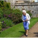 Queen Elizabeth II views a border in the gardens of Windsor Castle, where she received a Duke of Edinburgh rose, given to her by the Royal Horticultural Society (Photo by Steve Parsons - WPA Pool/Getty Images)
