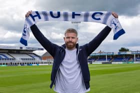 Adam Clayton.