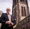 Easington Colliery band secretary Peter Lawson outside Durham Cathedral
Photo : BBC/Chalk Productions/Paul Stephenson