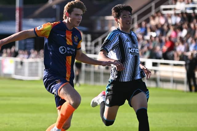 Spennymoor Town full-back Campbell Darcy and Newcastle United U21s winger Seung-Soo Park (photo Tyler Lopes)