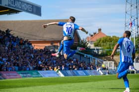 Will Harris celebrates a Hartlepool United goal on the opening day.