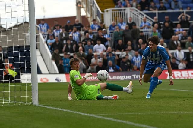 Chris Popov scores the only goal of Hartlepool United's home win against Woking (photo FRANK REID)