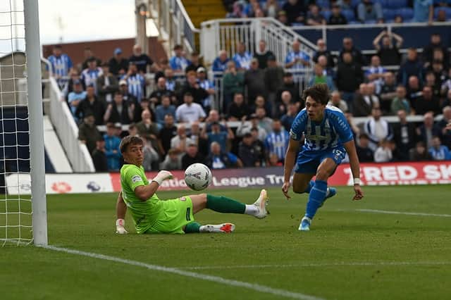 Chris Popov scores the only goal of Hartlepool United's home win against Woking (photo FRANK REID)