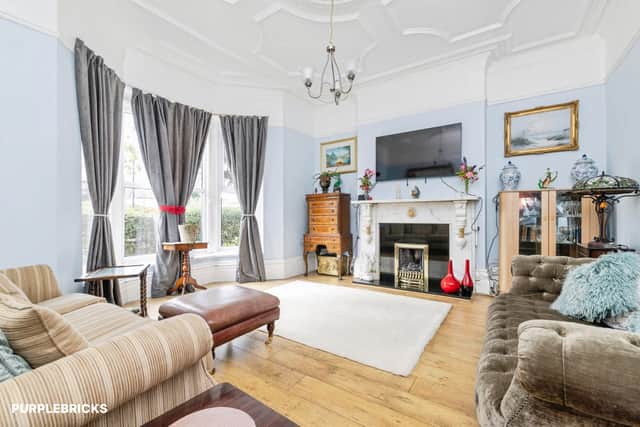 Three separate reception rooms provide flexible spaces for family life, dining, relaxing or working from home