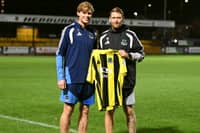 Hartlepool United youngster Campbell Darcy and Hebburn Town manager Daniel Moore.