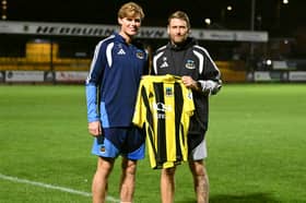 Hartlepool United youngster Campbell Darcy and Hebburn Town manager Daniel Moore.
