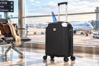 The ATX Luggage 21-inch hard-shell cabin suitcase has a 33-litre capacity, four dual spinner wheels and a built-in three-digit lock.