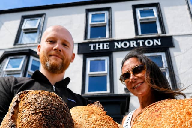 Butterfold Bakery's Scott Sutherland with Nicola Threadgold outside The Norton Hotel.