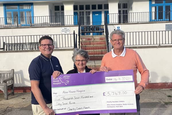 Nic Smith (left) and Alastair Rae (right) are pictured with Janice Forbes from Alice House Hospice.  

