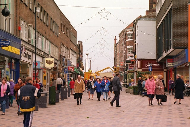 Shoppers enjoy the festive atmosphere of Westgate while Christmas shopping in December 1997.