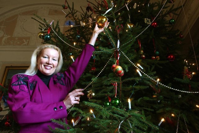 Volunteer Helen Brown with the Top Hall Christmas tree at Nostell Priory in December 2003. The huge tree remains a key feature of Nostell's festive celebrations