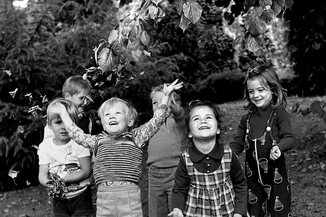 Wigan nursery age youngsters enjoy the Autumn leaves of 1976