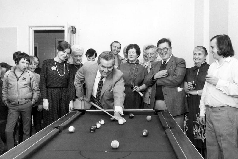 The Rt. Hon. Denis Healey enjoy a game of pool after opening South Gipton Community Centre in February 1984.