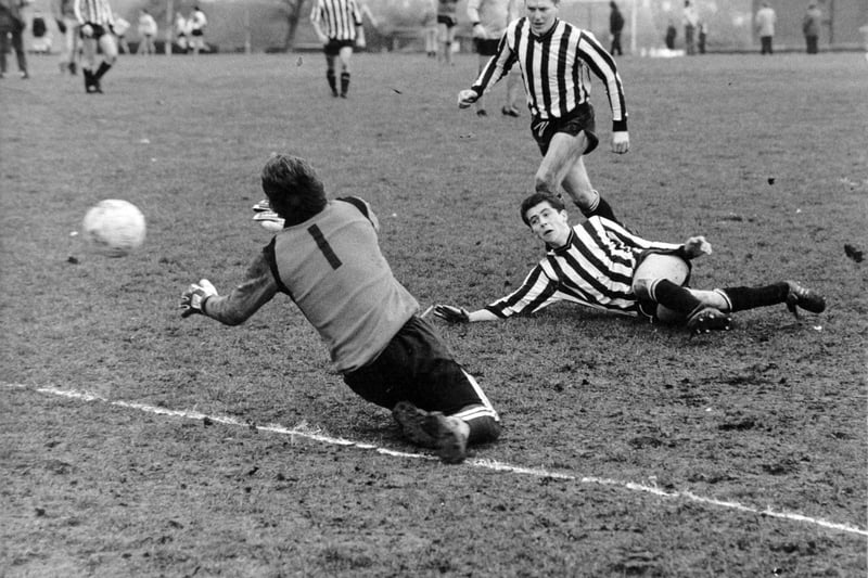 Gipton Hotel goalkeeper Martin Richardson is powerless to prevent Stuart Taylor scoring for Intake during the Leeds Sunday League game in January 1989.