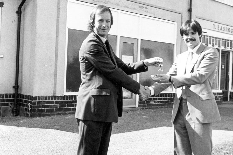 Councillor Michael Simmons (left) hands over the keys to the new Gipton Housing Office to the new housing manager Bob Prince in September 1982.