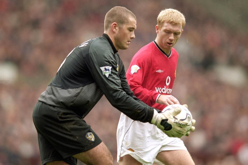 Paul Robinson is watched by Paul Scholes during the Premiership clash against Manchester United at Old Trafford in October 2000. The Red Devils won 3-0.