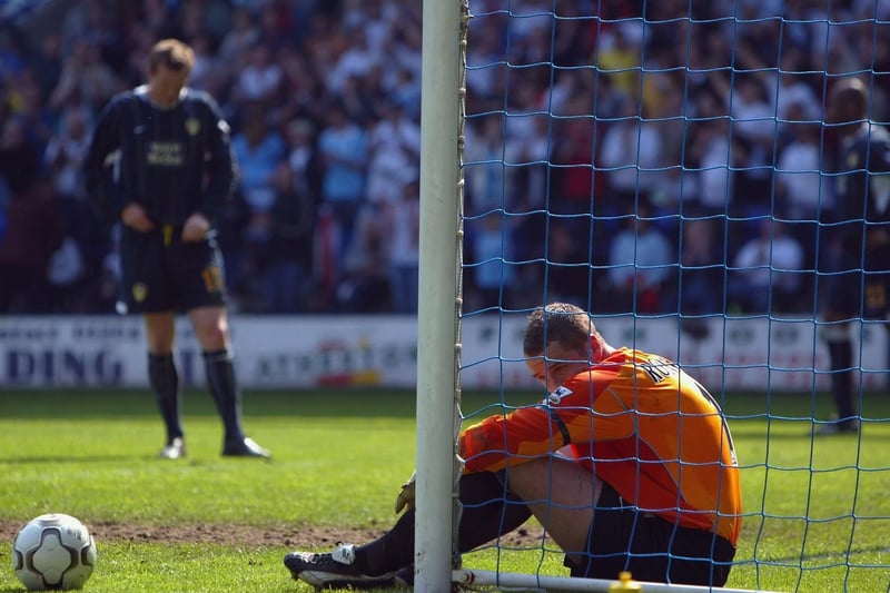 Paul Robinson is left devasated after conceding the third goal against Bolton Wanderers during the Premiership clash at the Reebok Stadium in May 2004.