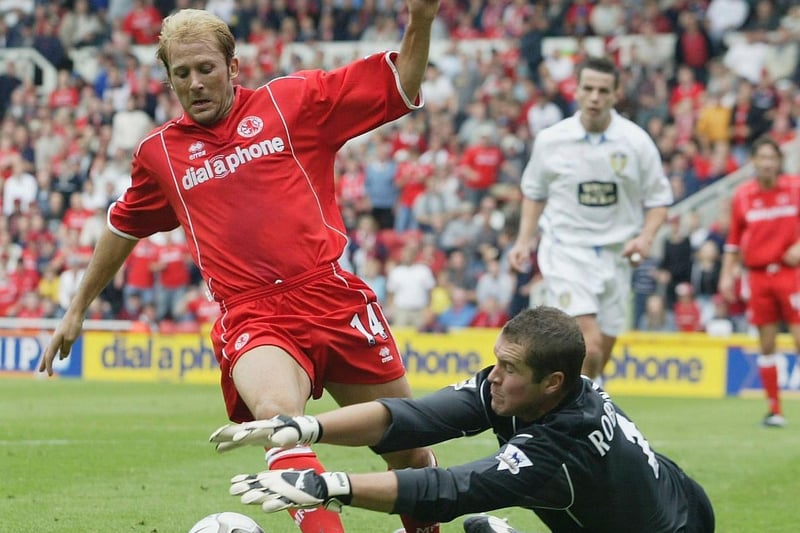 Paul Robinson saves at the feet of Middlesbrough's Gaizka Mendieta during Premiership clash at the Riverside Stadium in August 2003.