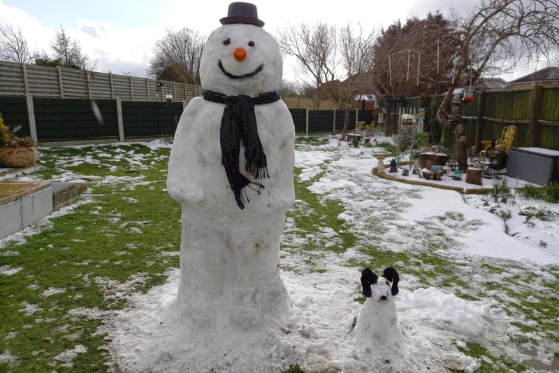 Snow man with snow pup!