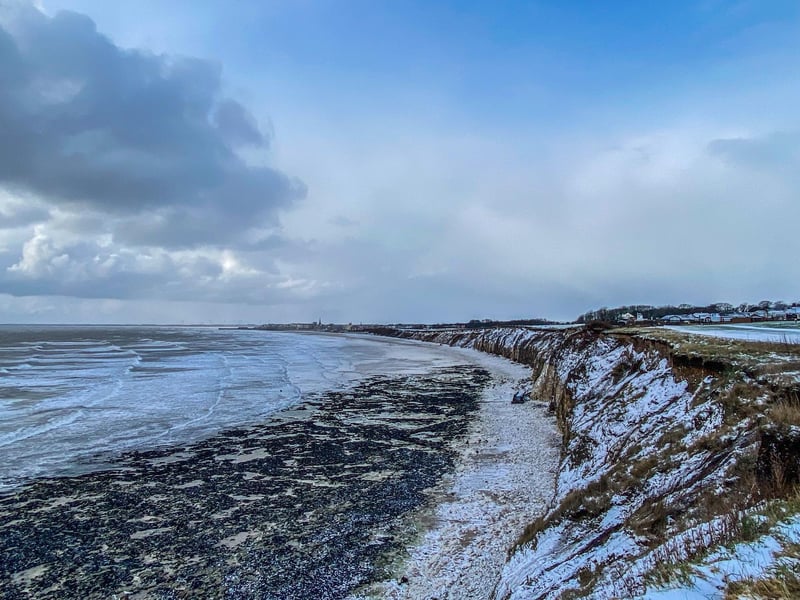 The cliff tops in the snow.
