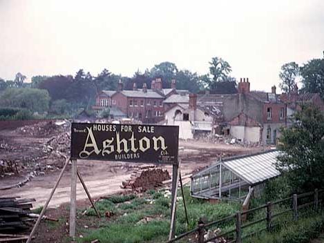 August 1964 an work has begun at the site of Hall Orchards house and garden to put up a new housing development by Ashton's. A sign on the land advertises the houses for sale. The development was located off York Road.