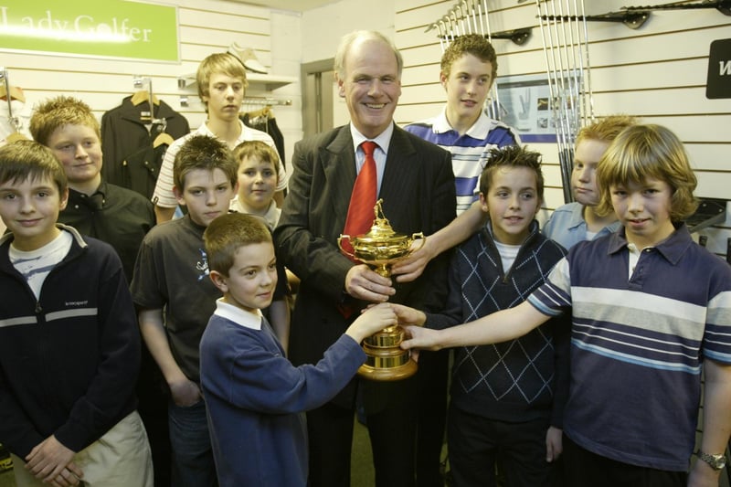 Sandy Jones cheif executive of the PGA with junior members at Lightcliffe Golf Club with the Ryder Cup.