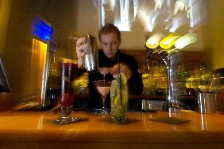 Inside The Rock Bar on Call Lane. Pictured is assistant manager Simon Douglas preparing cocktails in November 2009.