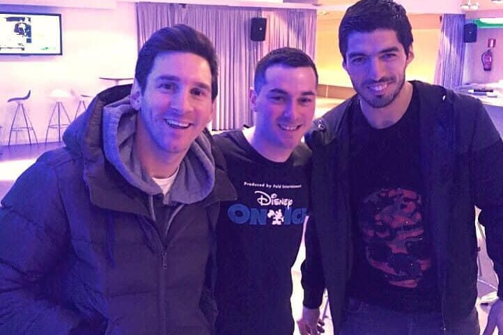 Adam Rogers with Barcelona stars Lionel Messi and Luis Suarez in 2016