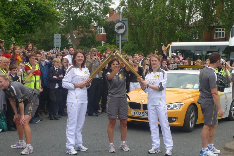 In total, the Olympic torch procession passed through more than 1,000 towns and cities, travelling 8,000 miles before arriving in the Olympic Park on July 27, 2012.
