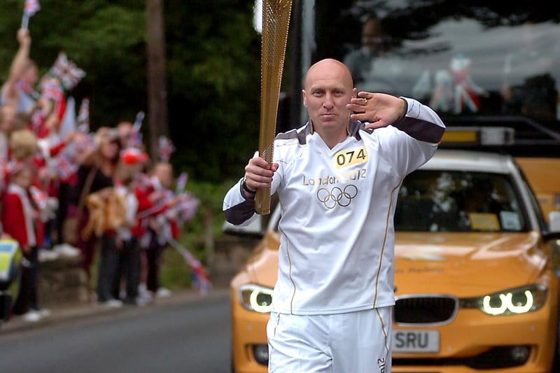 Torch bearer Mick Cordall carried the Olympic Torch as it made its way through Ackworth.