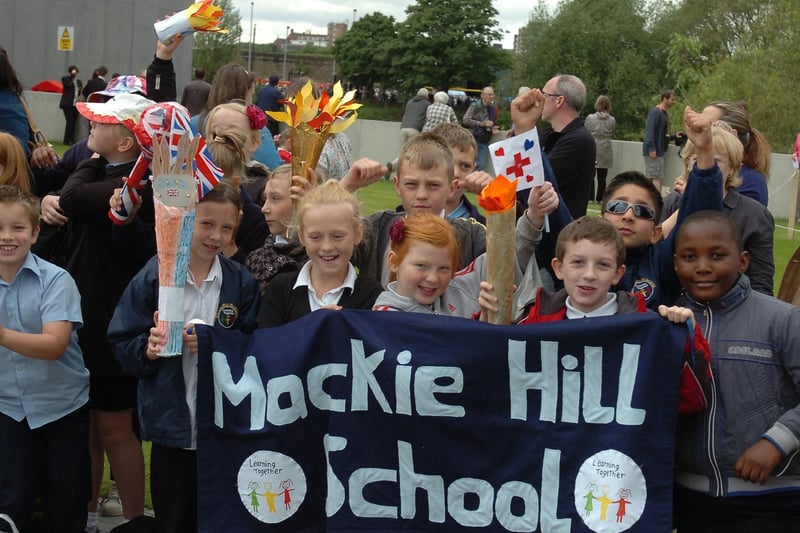 Students from Mackie Hill brought their own Olympic torches to cheer on the runners at the Hepworth.