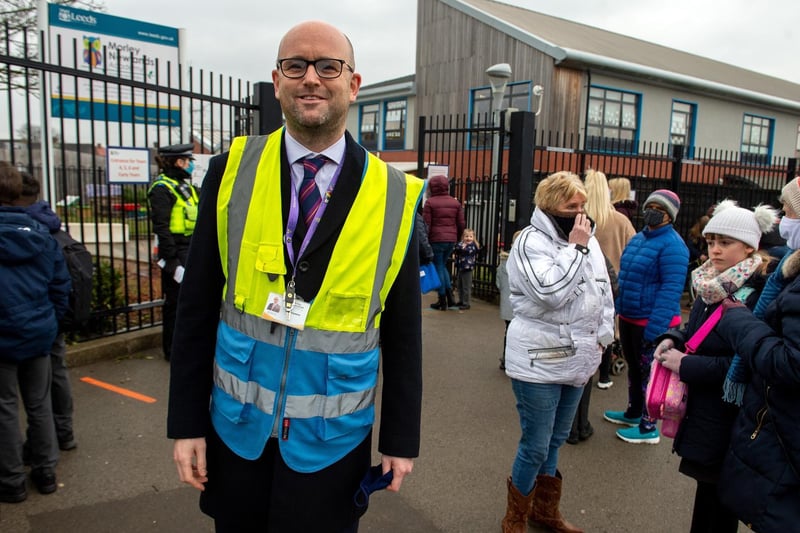 Matthew Fitzpatrick, headteacher at Morley Newlands school welcomes pupils and parents at the school gates.