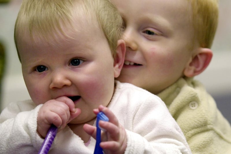 Little Francesca Townend and her brother William use the toothbrushes handed out at Pudsey Health Clinic as part of the Brushing for Life scheme in November 2001.