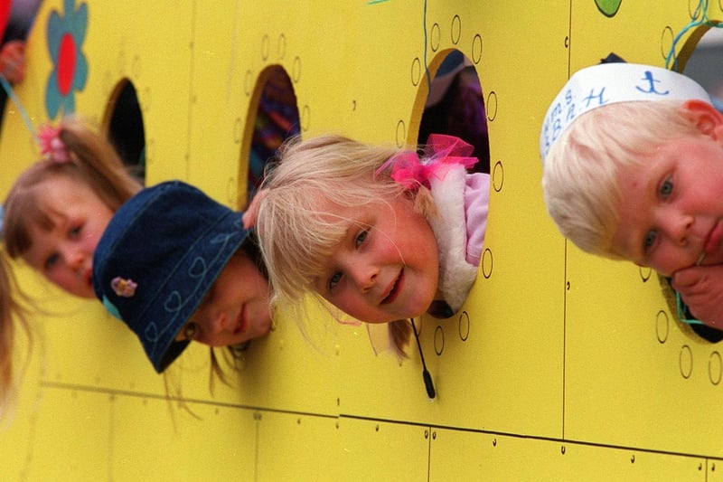 May 2001 and children are pictured on the Association for Spina Bifida and Hydrocephalus (ASBAH) float at Pudsey Carnival.