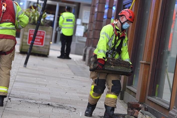 Firefighters remove huge pieces of chimney from Lune Street
