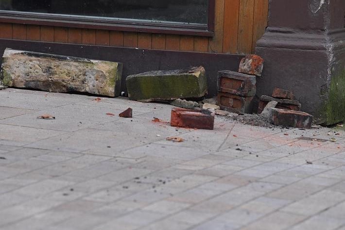 Bricks and masonry was strewn across the street