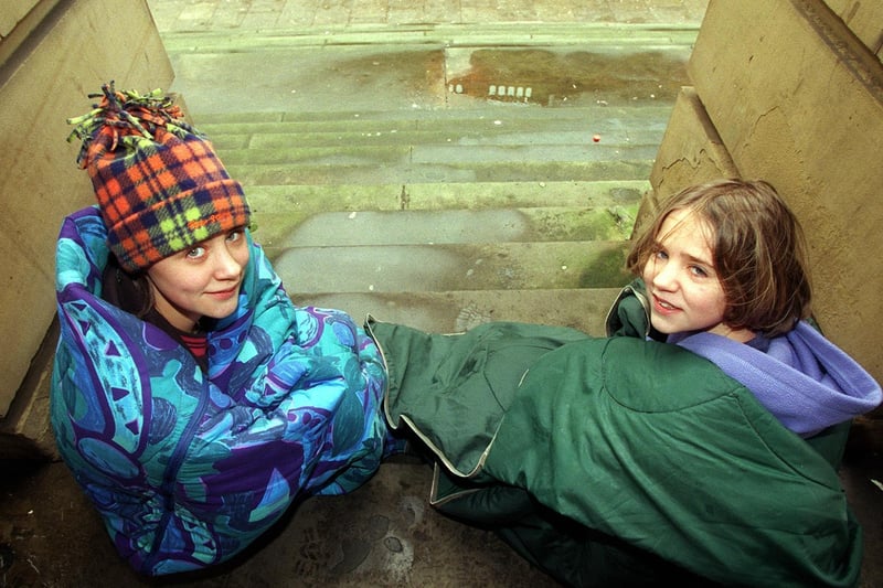 Sarah Dalton (left) and her sister Hannah on the steps of Morley Town Hall launching a campaign to collect sleeping bags for the homeless.