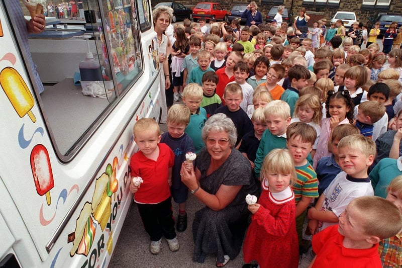 Kathleen Barron (front) ex-pupil and classroom assistant at Cross Hall Infants was retiring after 29 years. She treated pupils to a disco at the school and a free ice cream.