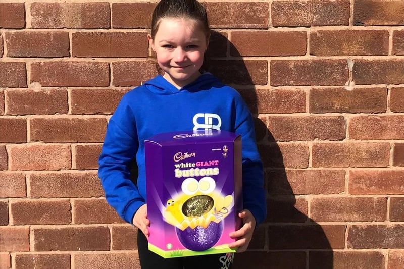 Scarlett Hodkinson, winner of the best painted rock competition pictured with her prize