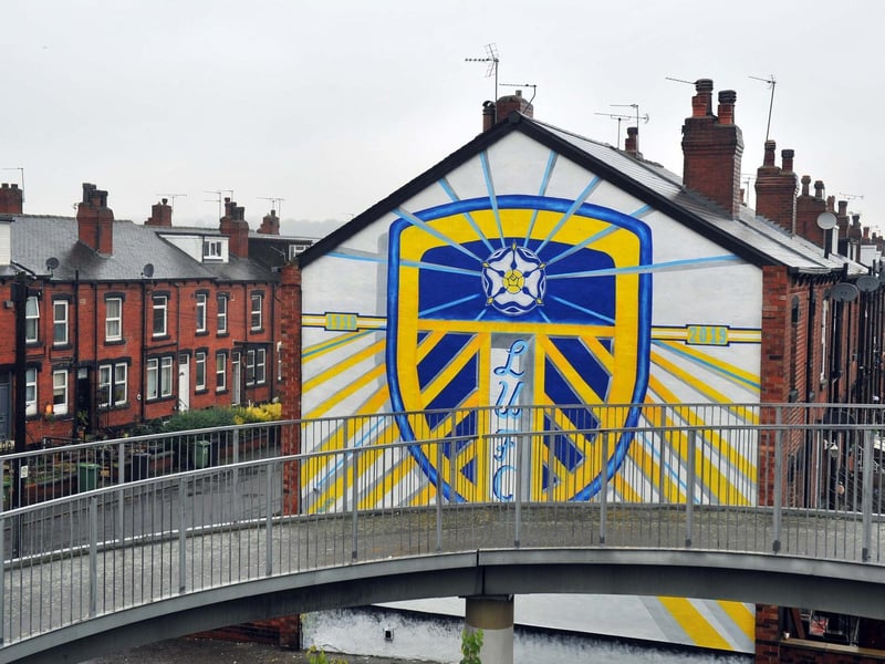 Shane Green, from Otley, created this mural of the Leeds United badge across two end of terraces on Tilbury Mount in Holbeck, near the footbridge for the M621.