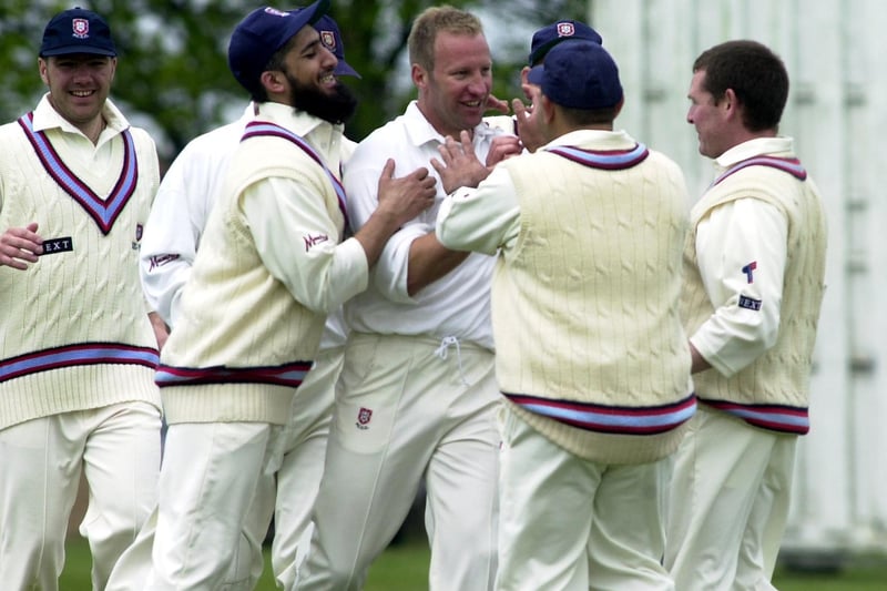 Pudsey Congs bowler Neil Gill (centre) is congratulated after taking his second wicket in successive balls against Yeadon in the Bradford League.