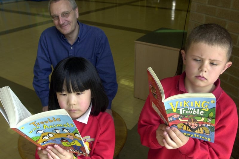 may 2002 and author Jeremy Strong visited Southroyd Primary. He is pictured with pupils Michelle Lee and George Hobson.