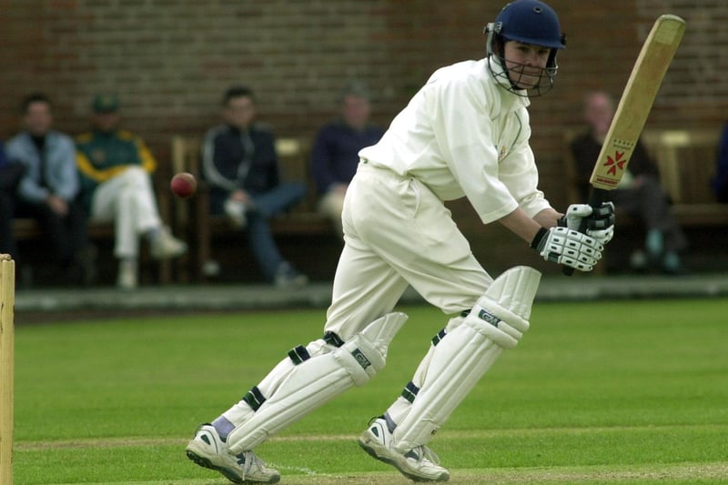 Pudsey St. Lawrence batsman Mark Robertshaw hits a boundry during his debut against Undercliffe aged 14.