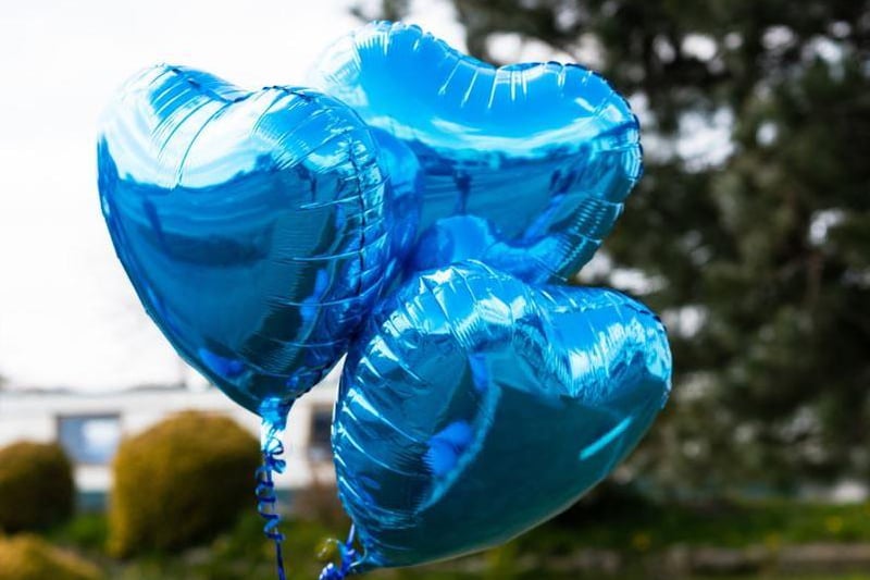 Blue balloons adorned the church grounds at St Hilda's Church
