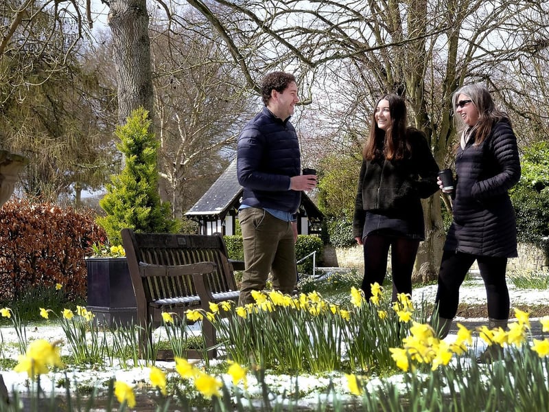 Shane, Sophie and Jaq Skelton enjoy a walk in Scalby Village.