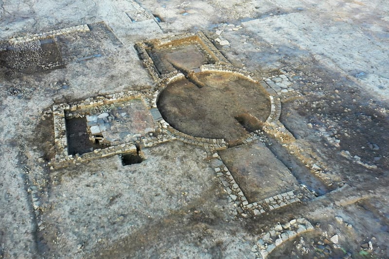 A Roman underfloor central heating system can be seen next to the circular room.