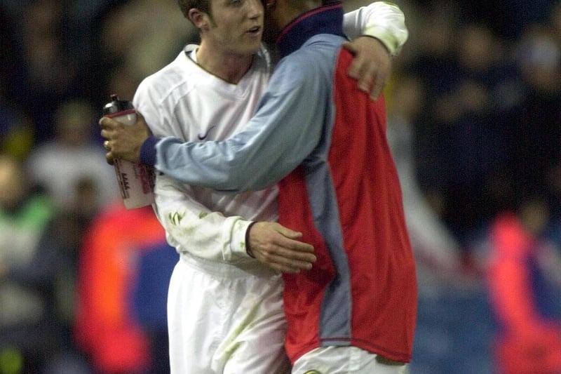 Lee Bowyer and Olivier Dacourt celebrate at full-time.