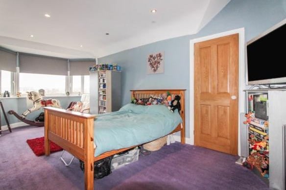 On the second floor are two double bedrooms. The first bedroom has a large front facing bay window and has access to a Jack and Jill bathroom en suite.