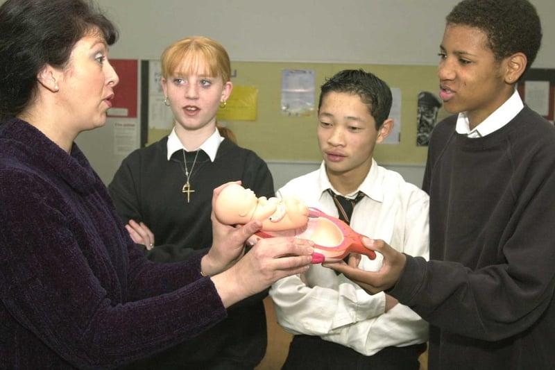 April 2000 and pictured is midwife Moira Mohit with pupils Lisa Russell, Vin Hoang and Michael Maynard in a personal health and social education lesson as part of the I'Too project.