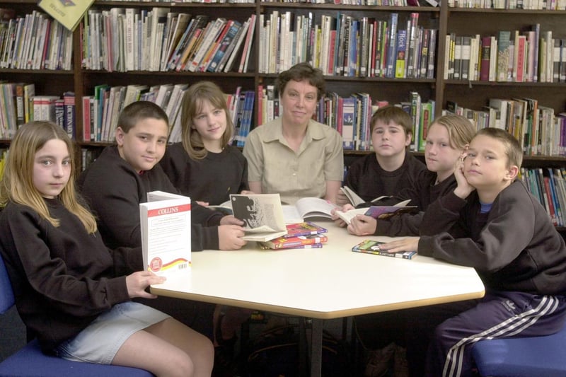 June 2002 and pupils are pictured during a literacy lesson. Pictured are Stevie MacCormick, Paul Wiley, Bobbie Waitte, librarian Bernadette Evans, Adam Hirst, Emma France and Andy Brewitt.